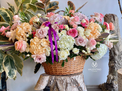 Palm leaves and roses in the basket